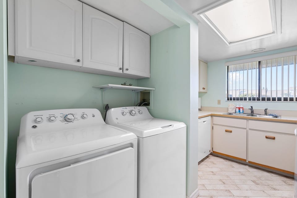 Enjoy the comforts of home with a washer and dryer ready for sandy towels and swimsuits. This beachside convenience keeps your coastal getaway fresh and carefree throughout your stay.