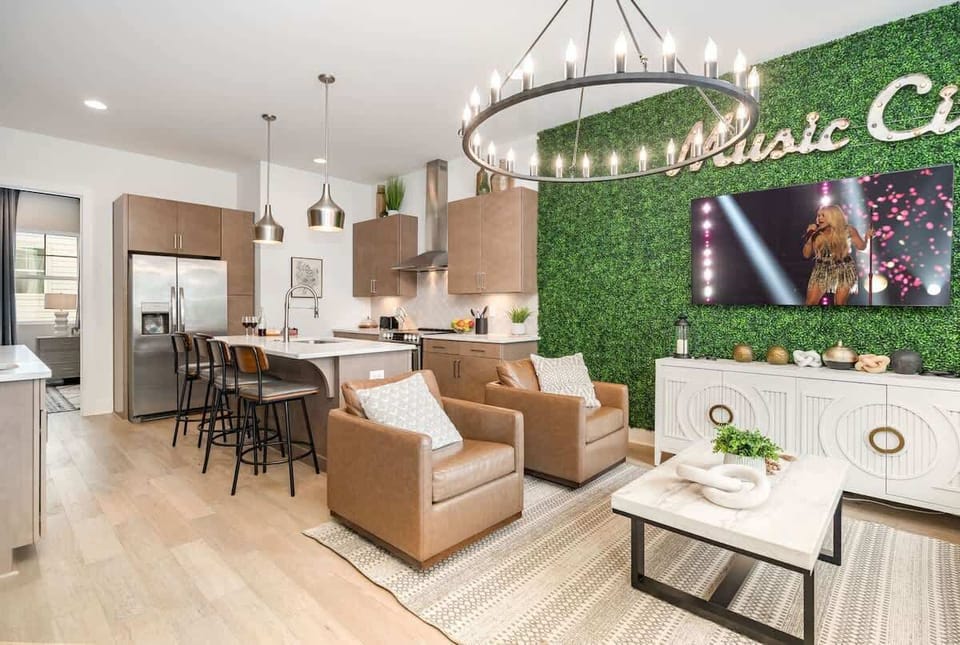 2nd Floor: Open concept living area with cozy seating and modern design that flows effortlessly into the open kitchen.