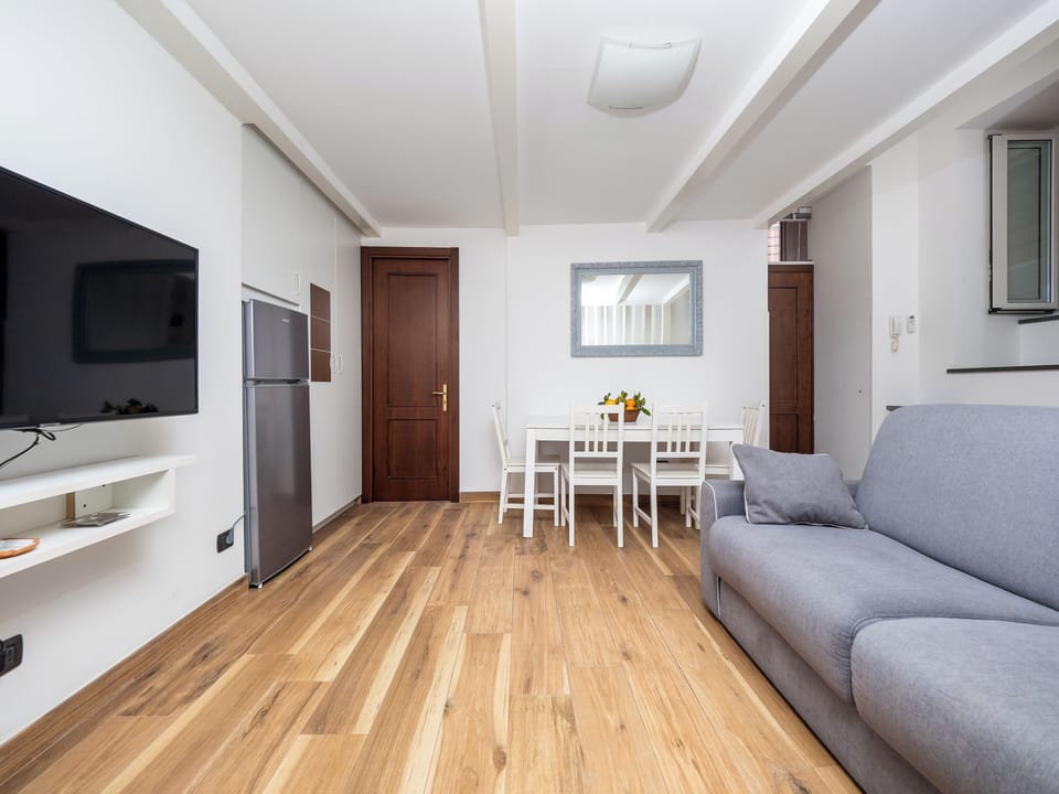 Standard Apartment | Living area | 46-inch Smart TV with digital channels