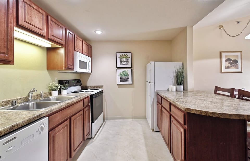 Cook with ease in a full kitchen with ample counters.
