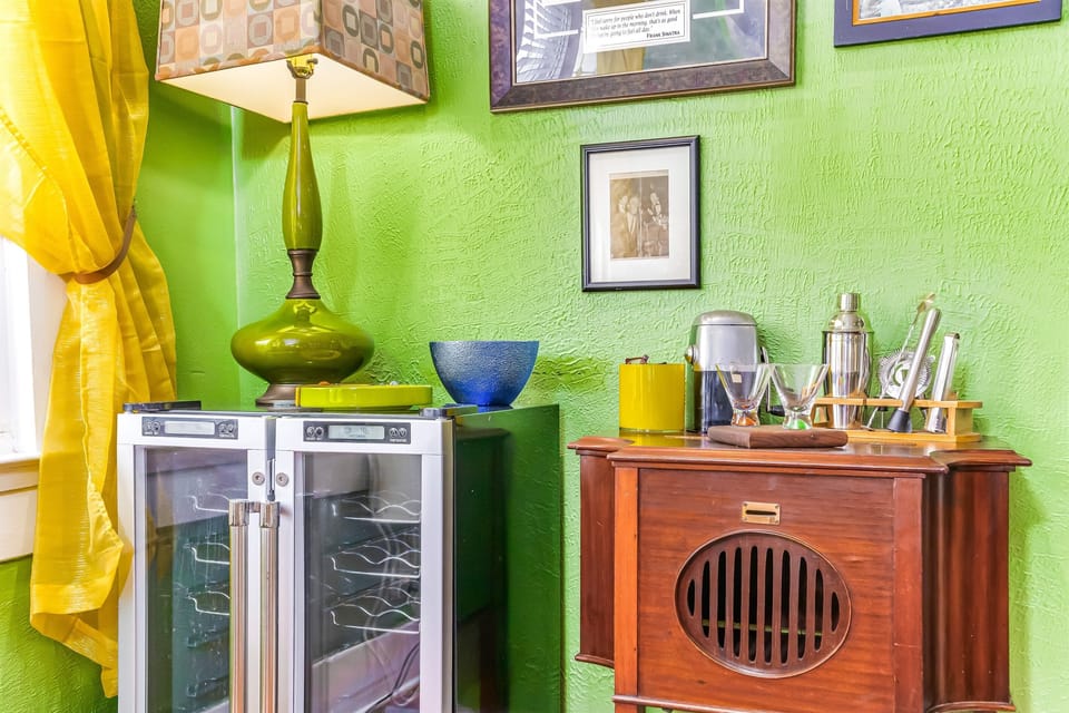 Curated wine and cocktail bar in century old Sears Roebuck home blends vintage charm with modern amenities near downtown Pensacola. BYO Beverage!