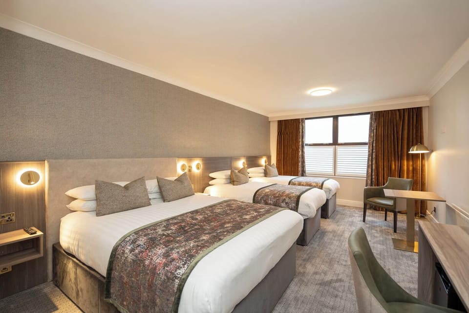 Family Room | Desk, iron/ironing board, free WiFi, bed sheets