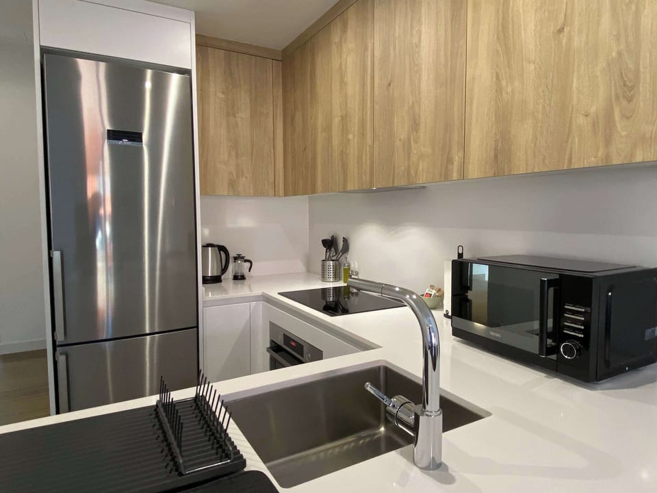 Kitchen with fridge/microwave.
