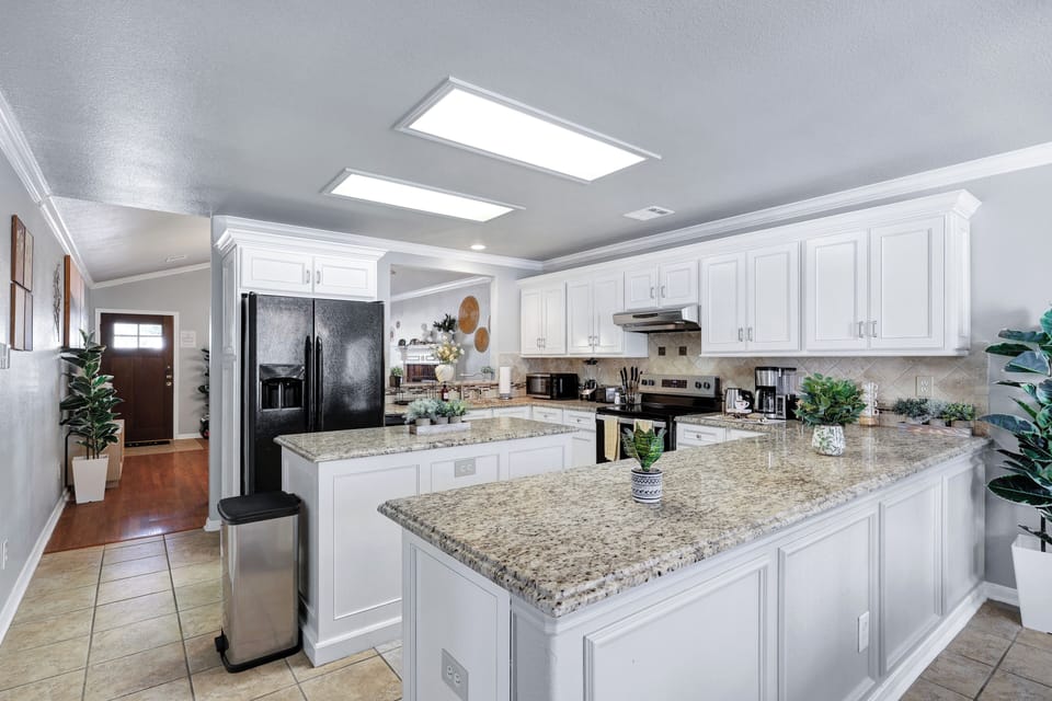 Stainless steel appliances. Fridge does NOT dispenses water or ice.