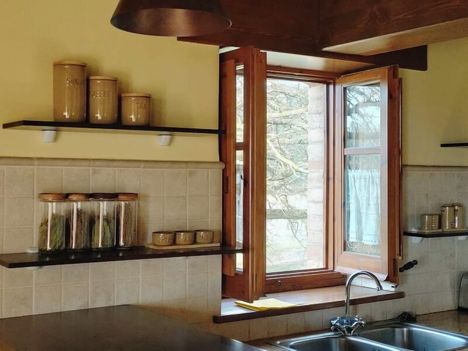 Comfort Apartment, Terrace | Private kitchen | Highchair