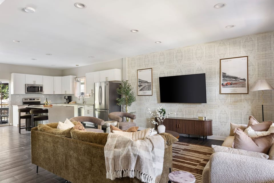 Step into our sleek and sophisticated living space with a touch of Indy flair.