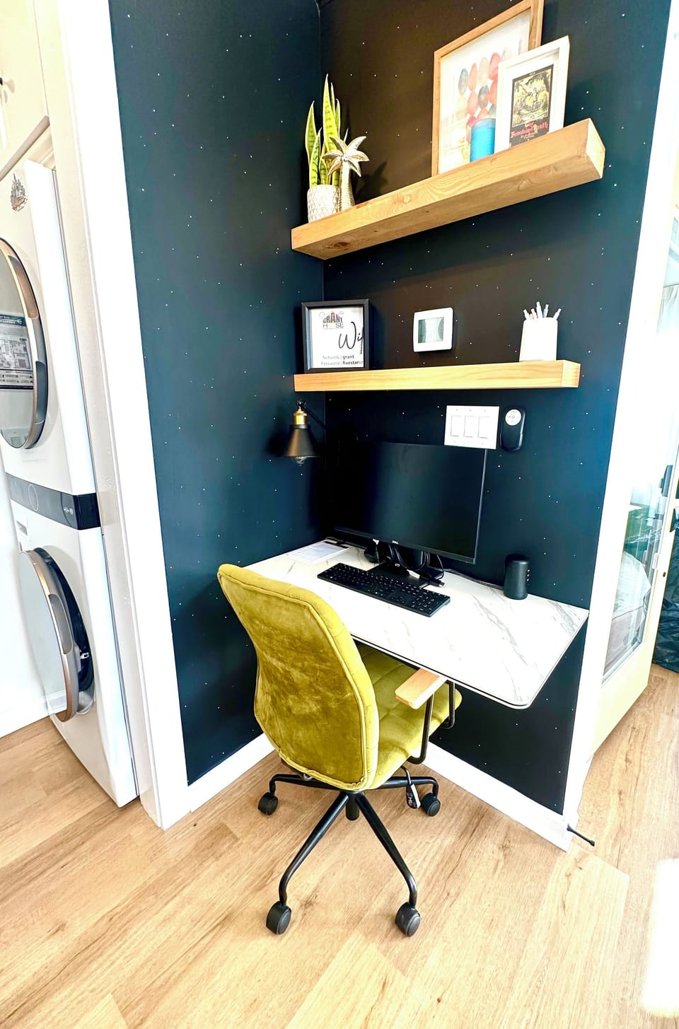 Office space with 24" monitor, mouse, and keyboard