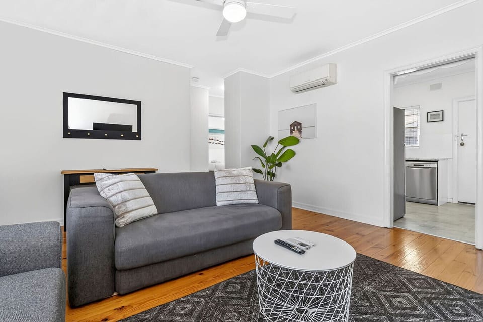 Comfortable, spacious couch perfect for relaxing after a long day or settling in for a quiet night.
