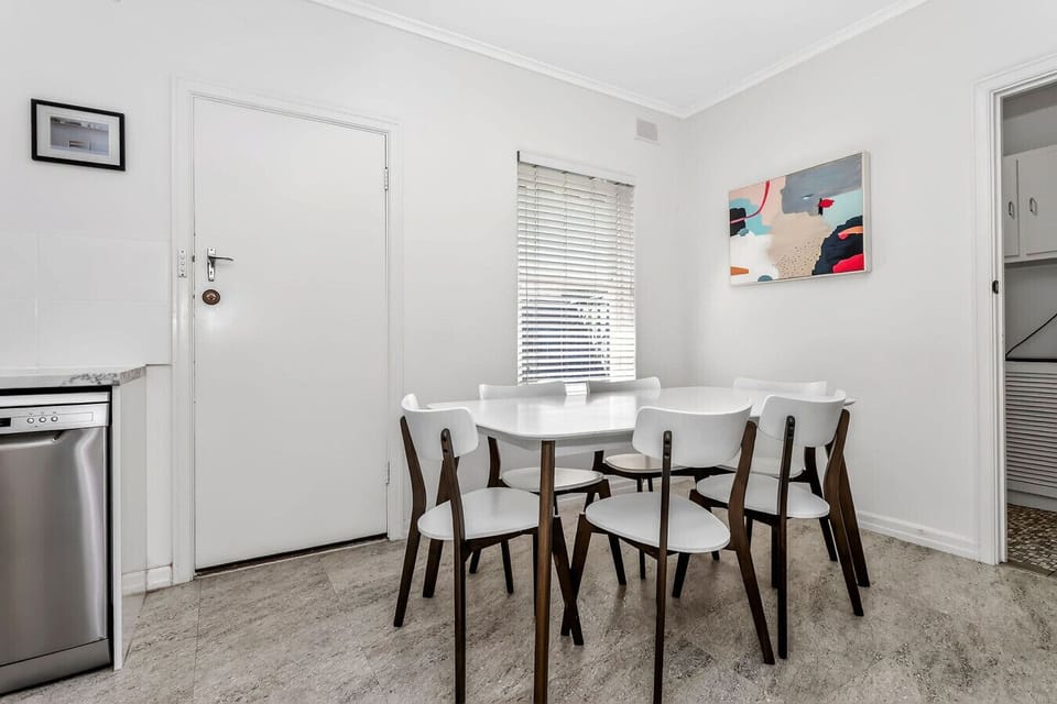 Inviting dining space ideal for shared meals, morning coffees, or a cheeky takeaway night in.