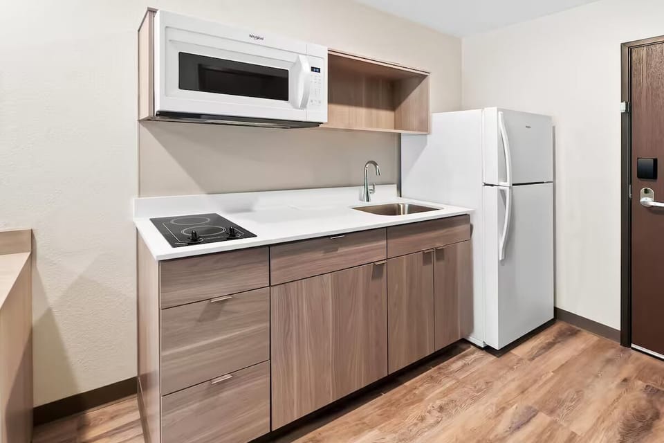 Whip up quick bites with cooktop, microwave, and full fridge.