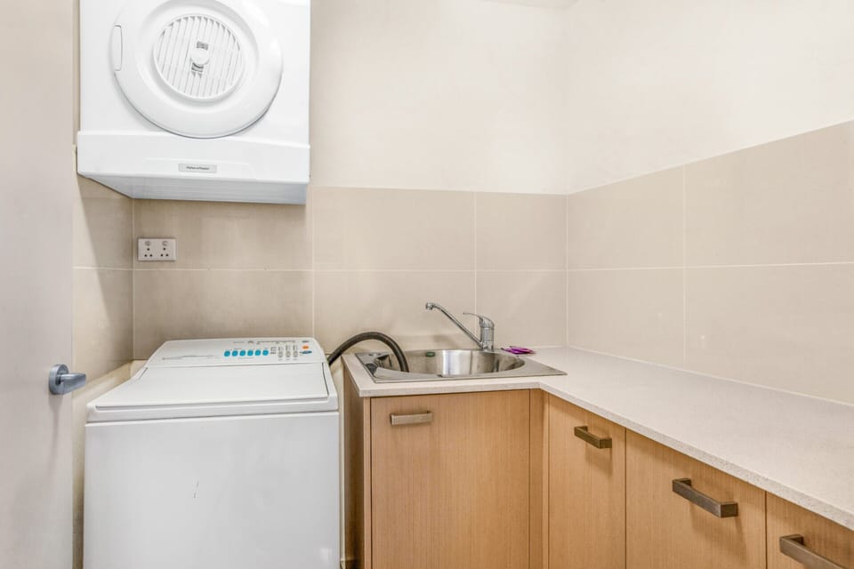 Apartment | Bathroom | Bathtub, hair dryer, towels, soap