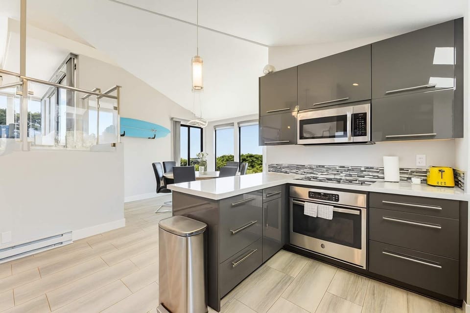 Enjoy a spacious, well-stocked kitchen with plenty of natural light.