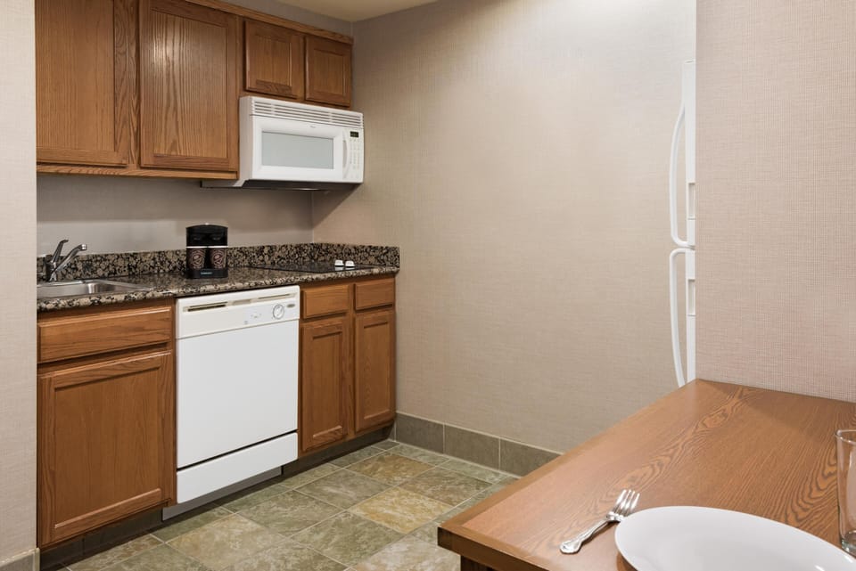 Studio Suite, 1 King Bed, Non Smoking | Private kitchen | Fridge, microwave, stovetop, dishwasher