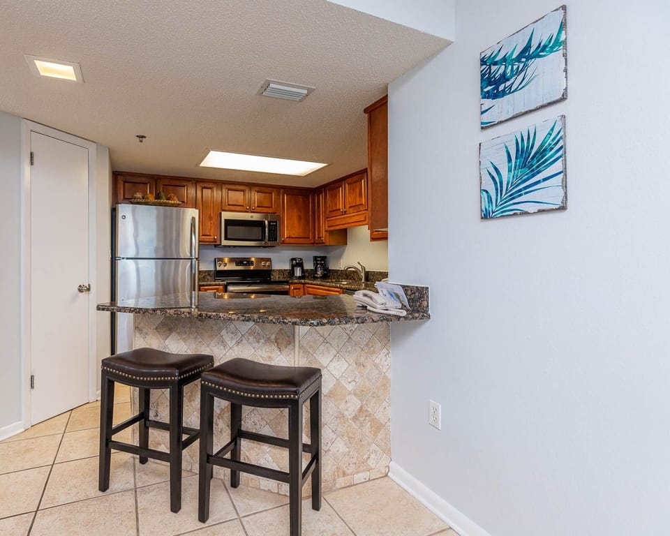 Condo, 2 Bedrooms | Private kitchen | Fridge, oven, coffee/tea maker