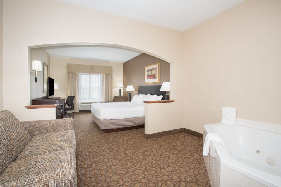Suite, 1 King Bed with Sofa bed, Jetted Tub (Wet Bar) | Premium bedding, pillowtop beds, desk, laptop workspace