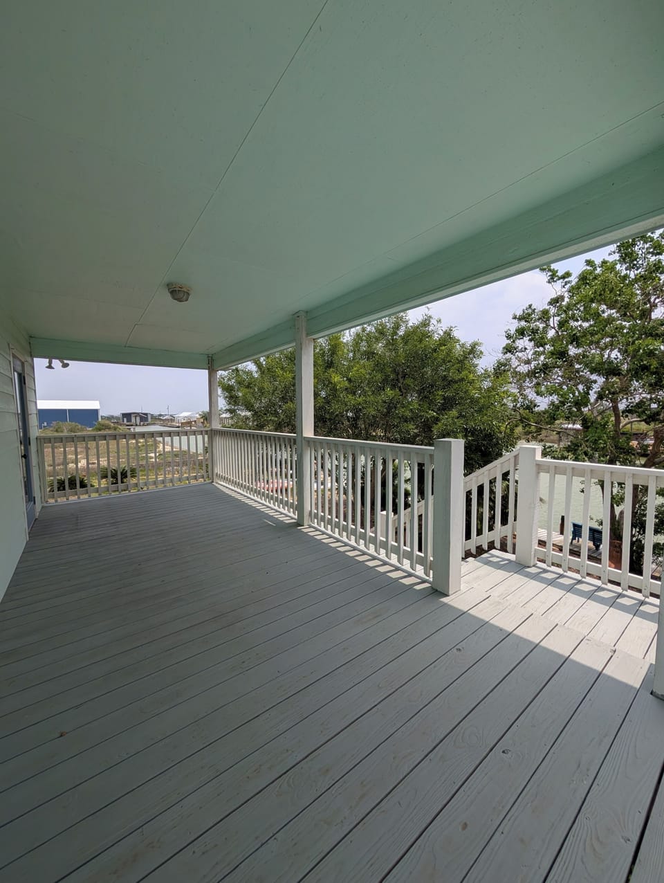 The large balcony also provide access to the top story of this home.