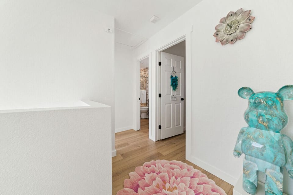 Bright hallway connecting your cozy bedrooms