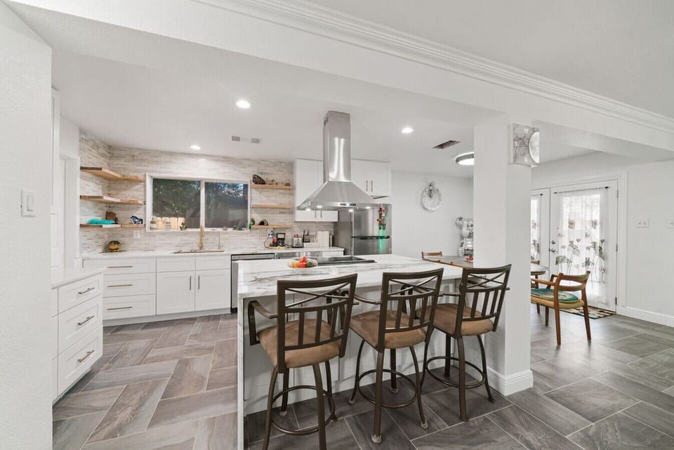 Open design connects kitchen, dining, and living — so you never miss a moment
