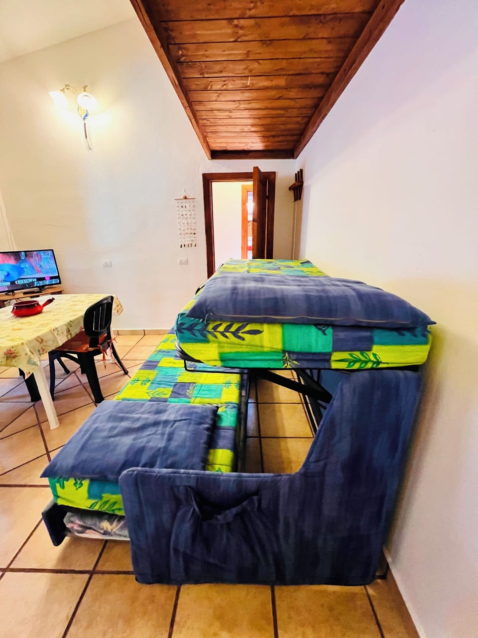 Apartment | Living area | 22-inch flat-screen TV with cable channels