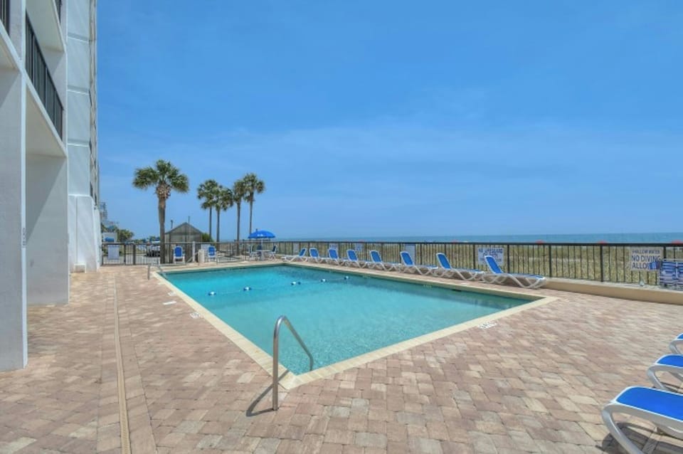 Take a cool dip in the pool after a fun day at the beach.