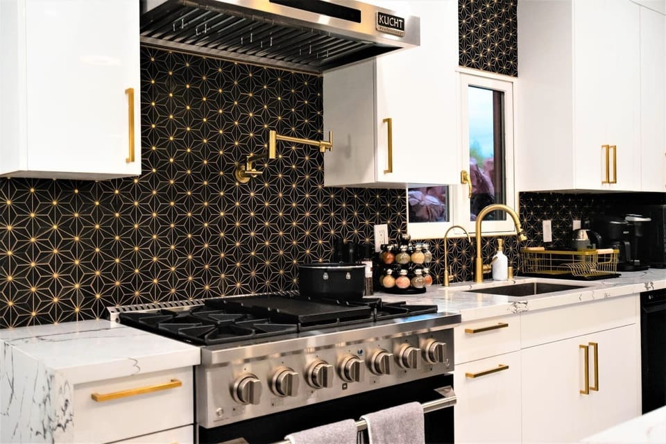 Professional 36" Kucht gas range and oven with pot filler.   We installed by the sink, a custom 6 stage reverse osmosis water filter for unlimited clean water for drinking and cooking.