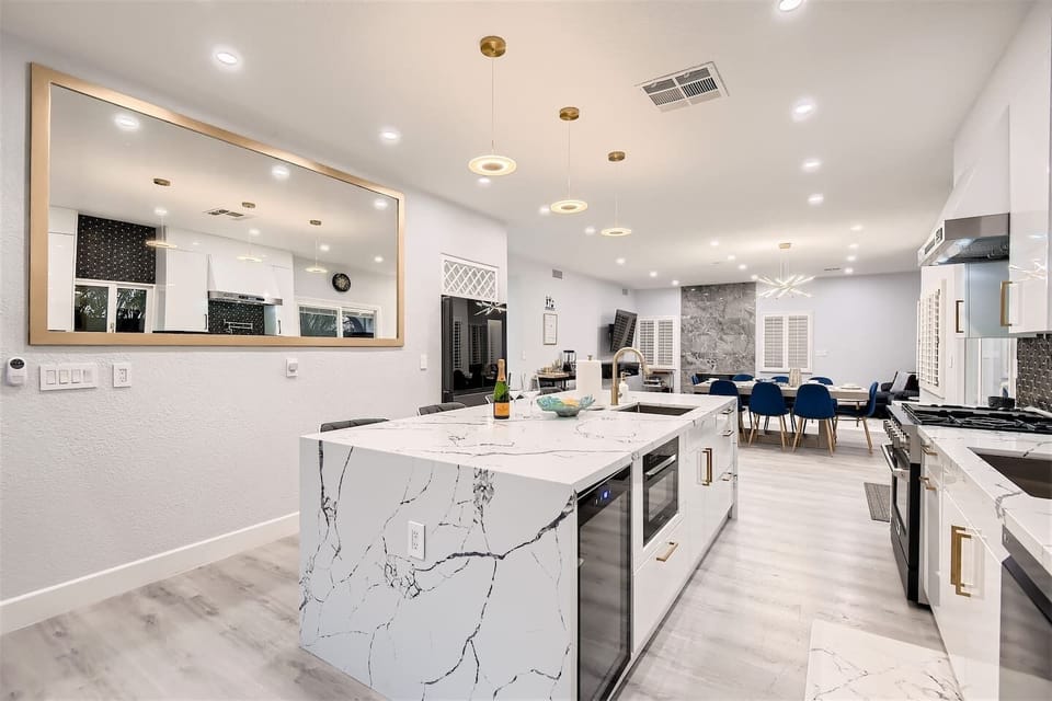Kitchen includes beverage cooler for wine and drinks, built in microwave/convection oven!