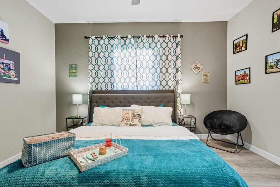 Inviting Bedroom 1 | Stylish Farmhouse Décor with Teal Accents | Cozy Comfort and Playful Charm