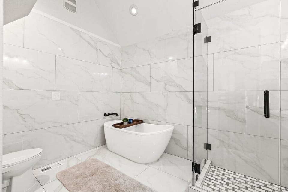 Soak and relax in the spacious king bedroom ensuite bathroom
