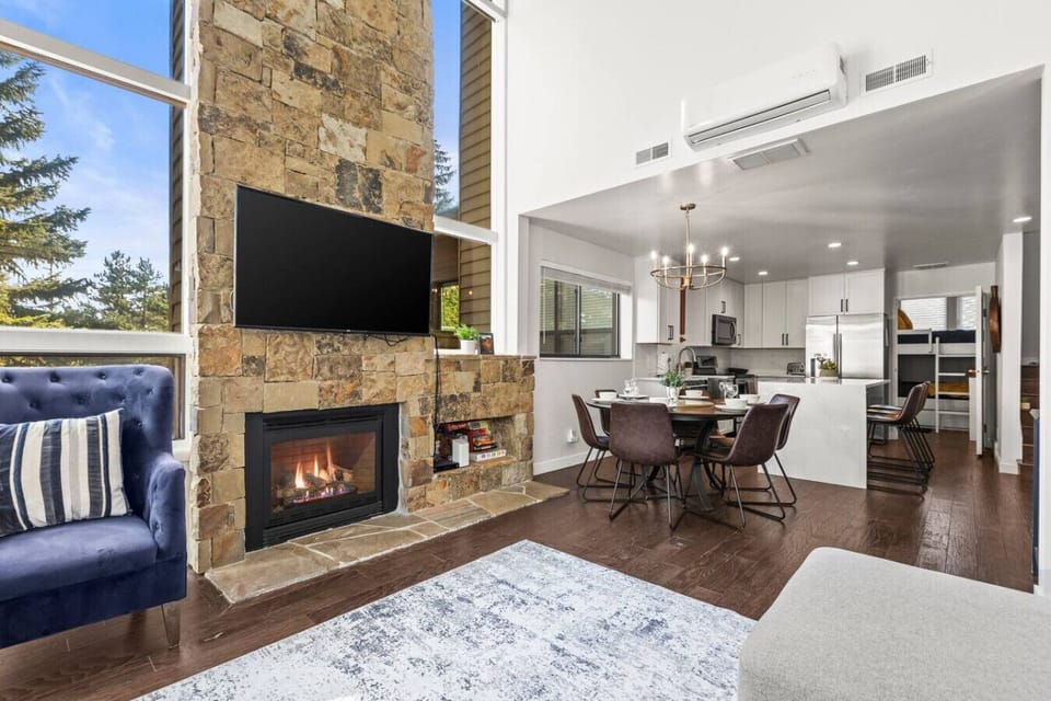 Relax by the fireplace or share a meal — this space was made for together time