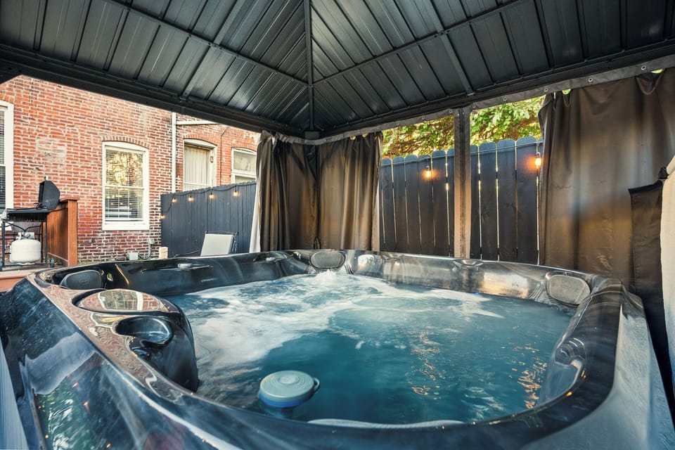 Hot Tub Oasis: Unwind in your private spa surrounded by twinkling lights!