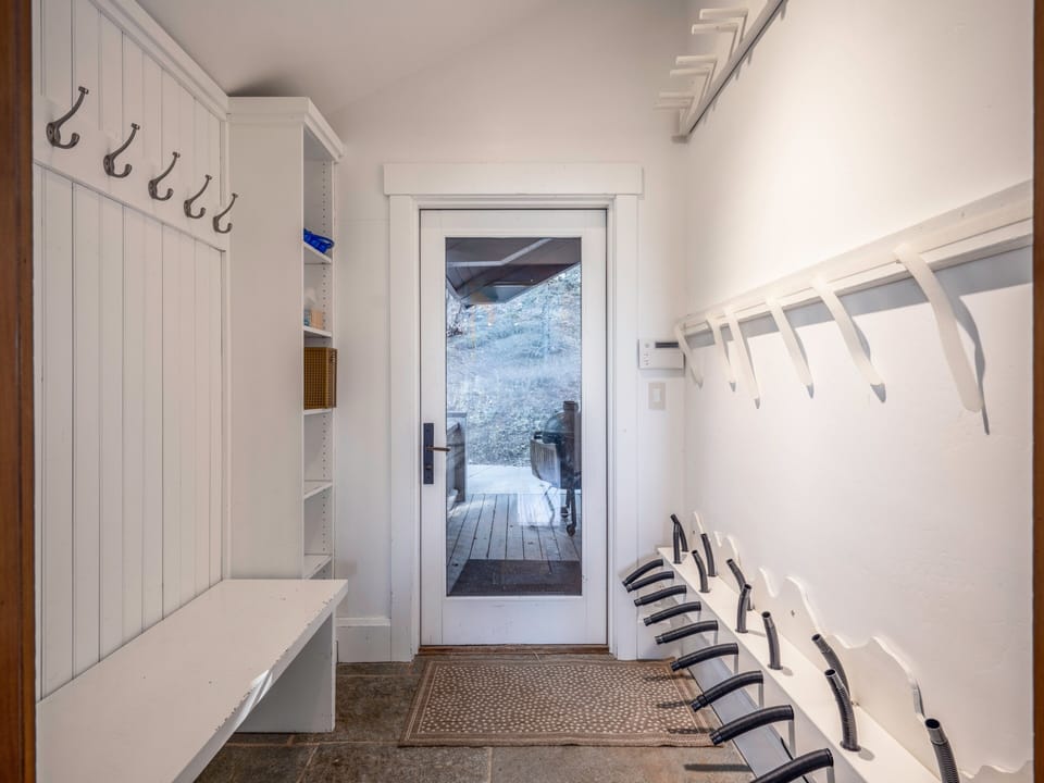 Ski/Mud Room: Gear storage, boot dryers, & direct access to the slopes