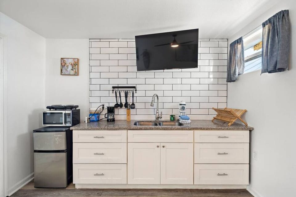 Whip up delicious meals in this charming kitchen