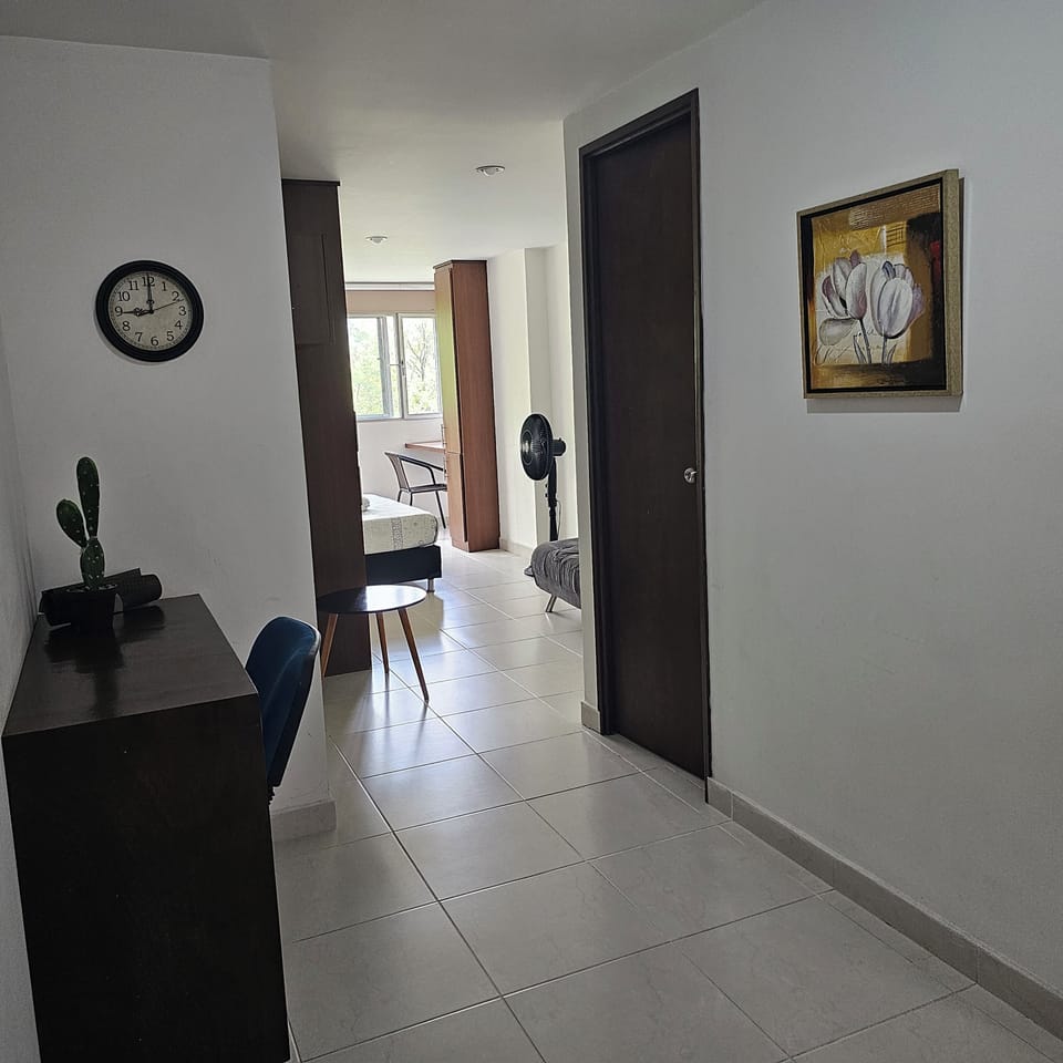 Loft, City View | Living area | Flat-screen TV
