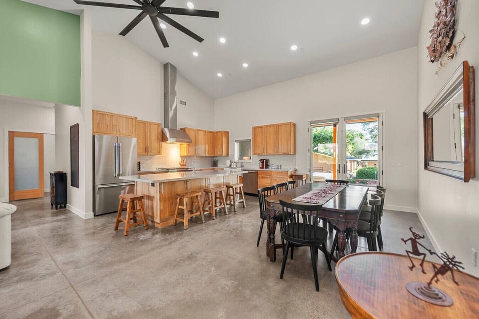 Entertain 8 guests at the dining table and up to 4 at the kitchen island in the chef’s kitchen