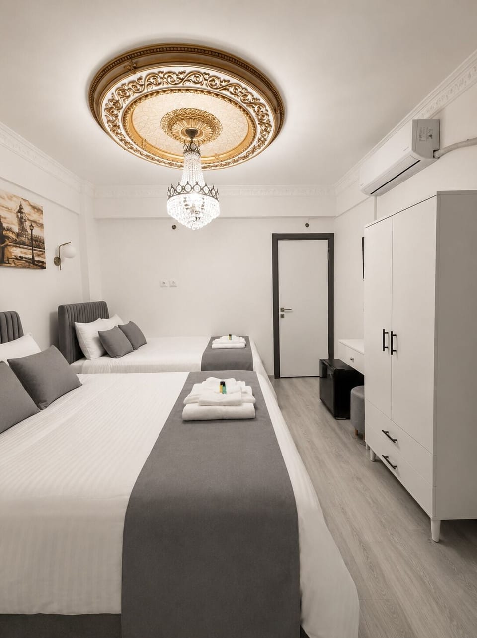 Deluxe Triple Room, City View | In-room safe, desk, blackout drapes, soundproofing