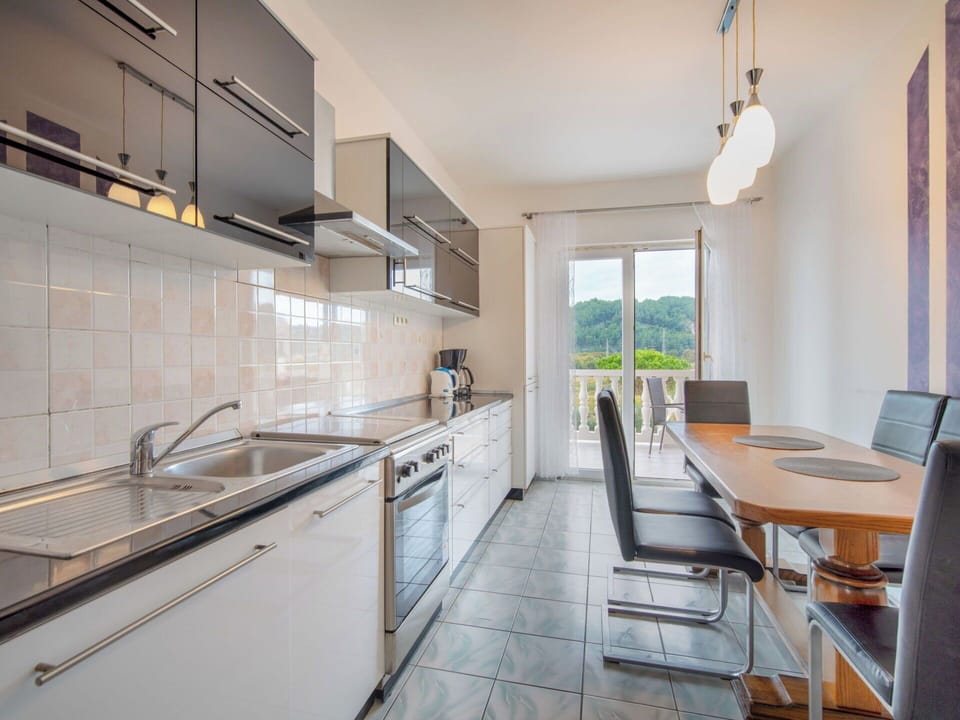 Furniture, Interior Design, Kitchen, Countertop, Flooring, Ceiling, Floor, Cabinetry, Kitchen & Dining Room Table, Room