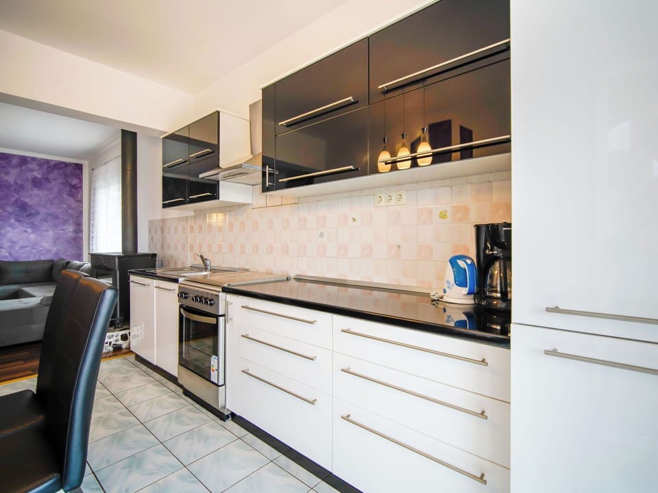Countertop, Kitchen, Kitchen Appliance, Cabinetry, Major Appliance, Flooring, Interior Design, Furniture, Lighting, Home