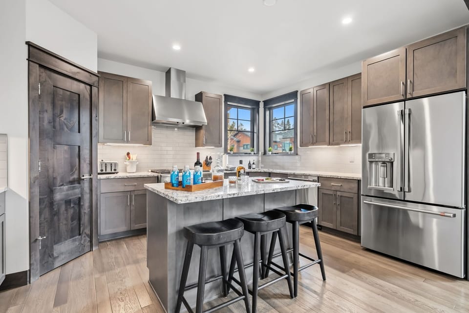 Kitchen: Main floor, drip coffee maker, Keurig, toaster, cooking utensils, tableware