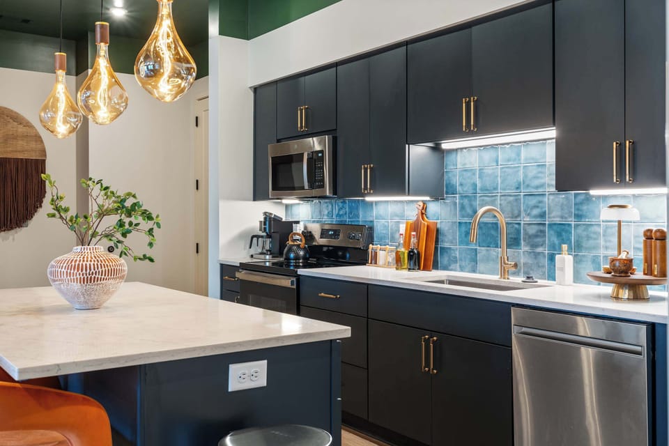 Stainless steel appliances and plenty of counter space in the kitchen.