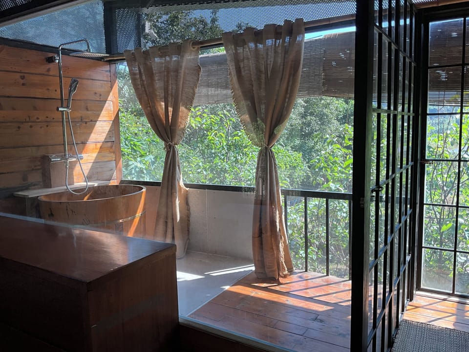 Design Studio Suite | Bathroom | Rainfall showerhead, designer toiletries, hair dryer, bidet