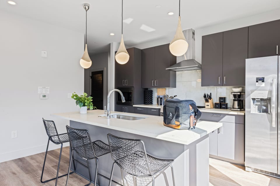 Relax at the kitchen counter with barstool seating.
