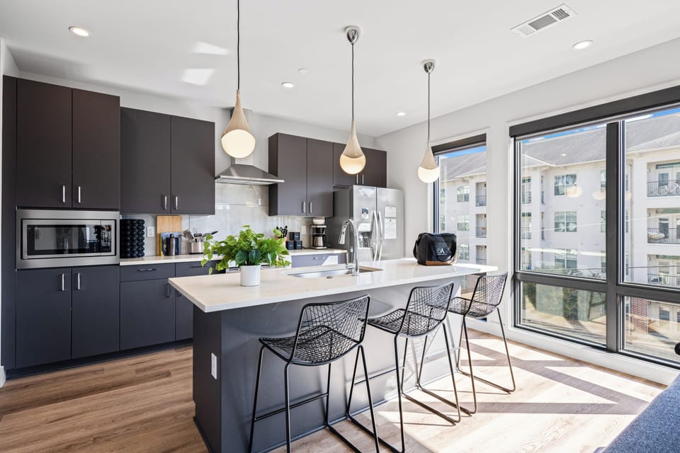 Relax at the kitchen counter with barstool seating.