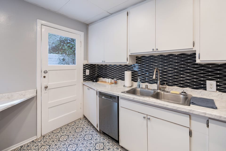 Reliable appliances and ample counter space for meal prepping in the kitchen.