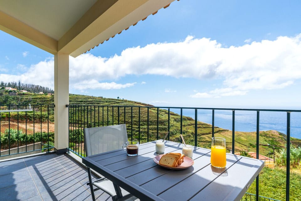 Morning light and ocean views from private balcony.