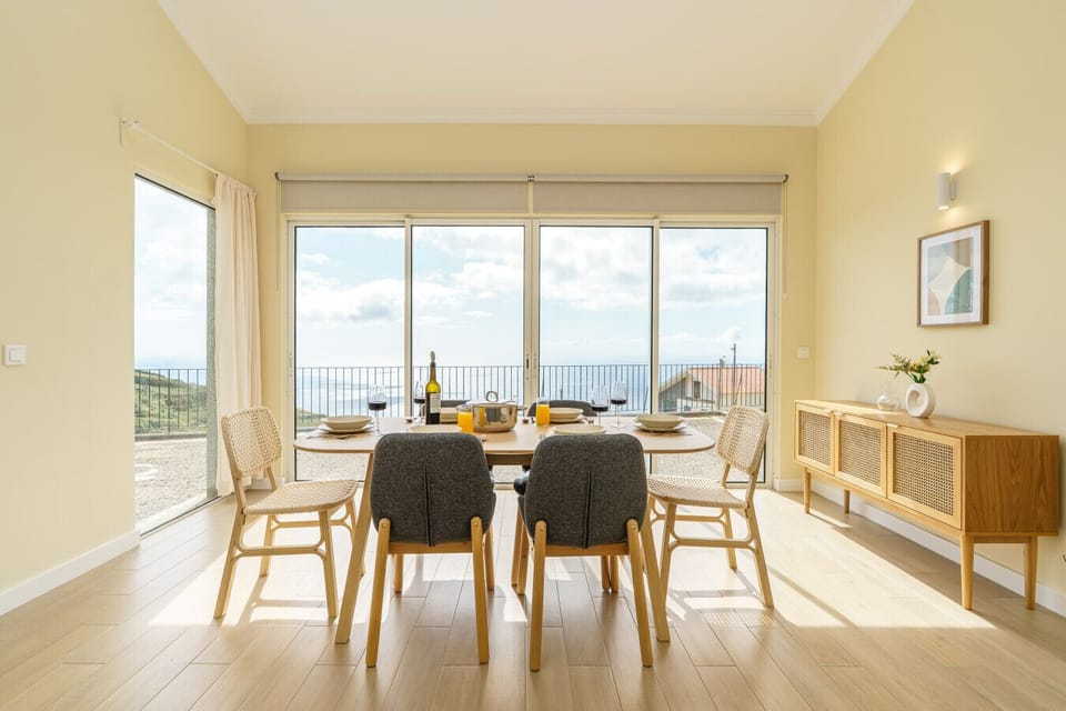 Dining area bathed in natural Madeira light.