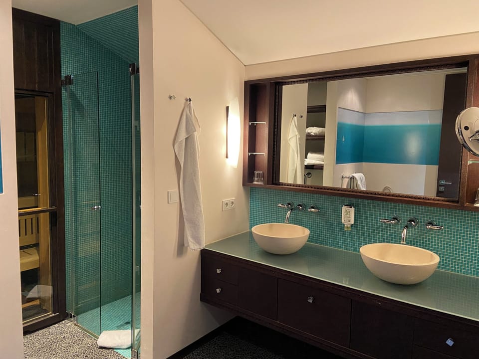 Studio Suite | Bathroom | Shower, hair dryer, bathrobes, towels