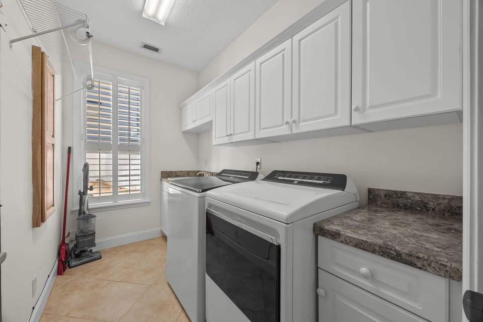 In-unit laundry with washer and dryer for added convenience