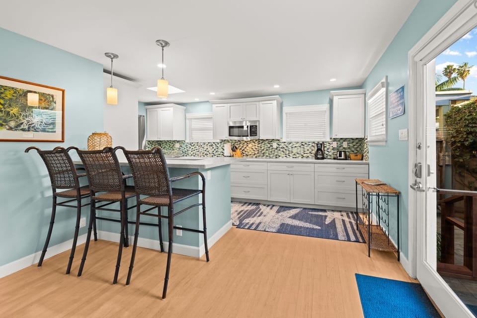 Kitchen is  equipped with cooking  basics  and appliances