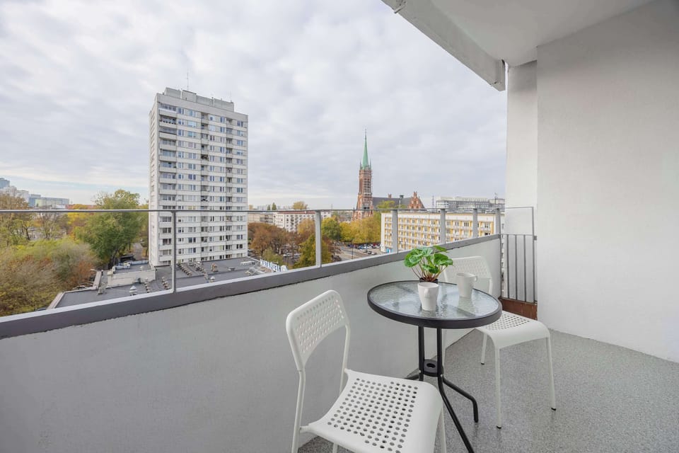Balcony with a city view – Enjoy morning coffee or evening sunsets outdoors.
