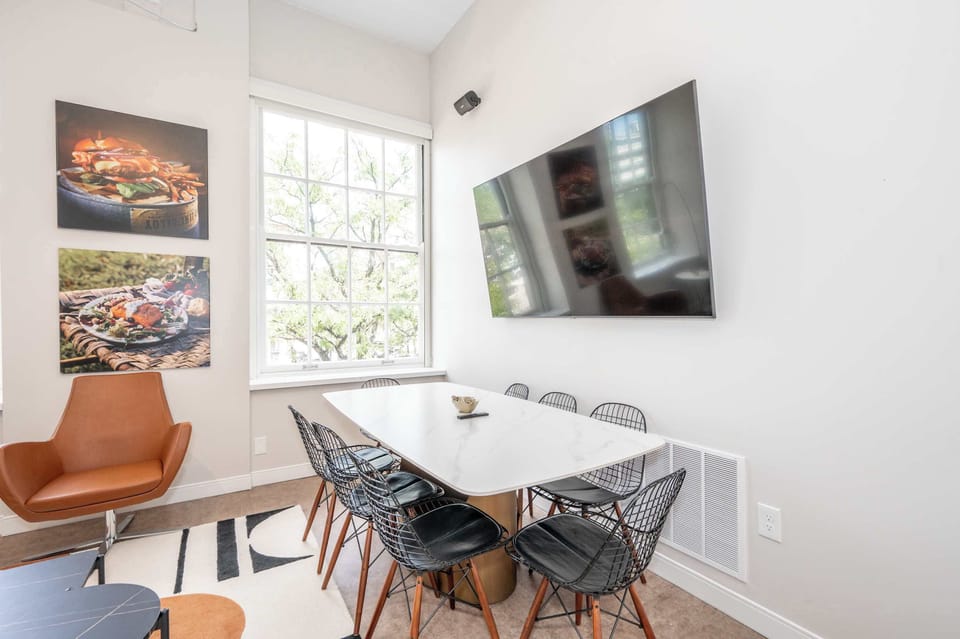 Gather for meals together at the dining table, seating 8​